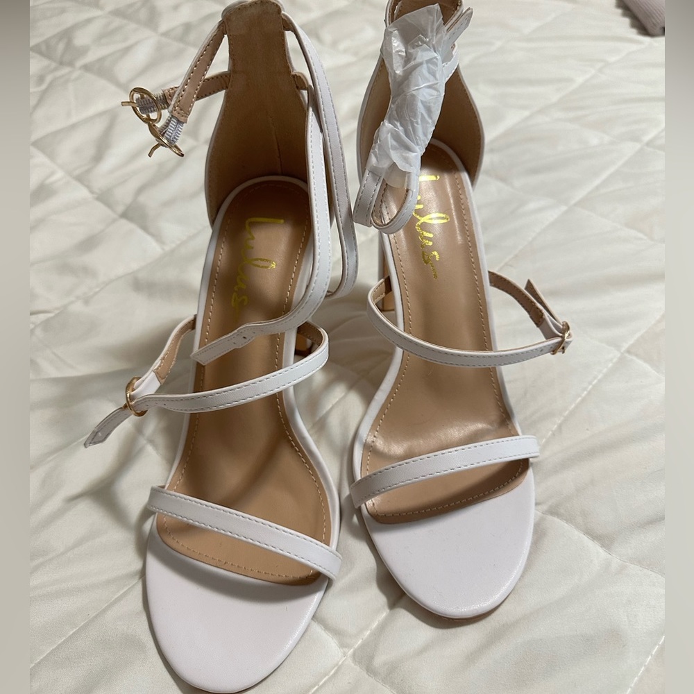 Lulus white heals, brand new.